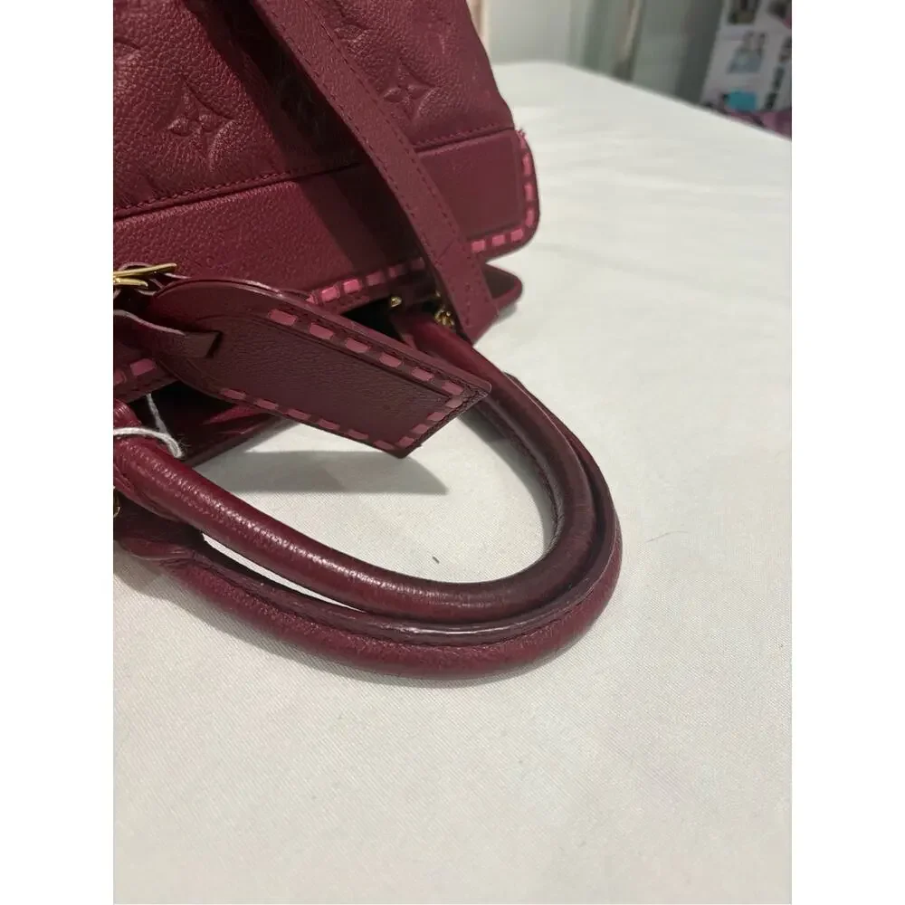 Authentic Louis Vuitton Monogram Empreinte Montaigne MM bag w/ Certificateate